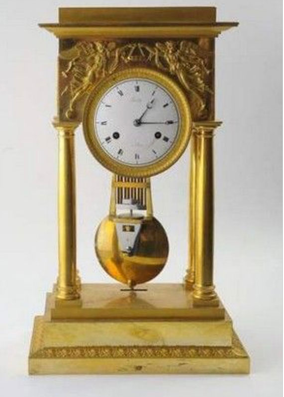 Horloge ancienne mécanique dorures